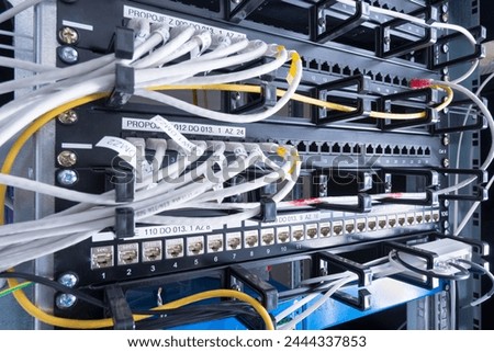 network panel, switch and cables inside internet data center