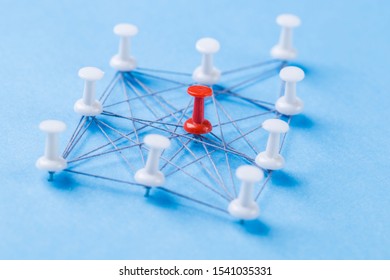 Network With Red And White Pins And String, An Arrangement Of Co