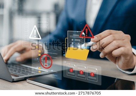 Network security concept, Businessman working with digital documents and red warning sign. Folder alert with error.