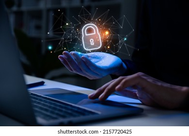 Network security, data protection blockchain and private key concept, Businessman holding padlock icon.