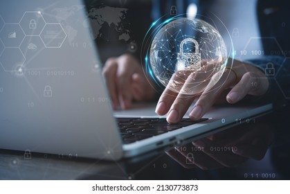 Network security, digital crime, personal data protection, business technology concept. Business woman using laptop computer with globe and cyber security icons on virtual display - Shutterstock ID 2130773873