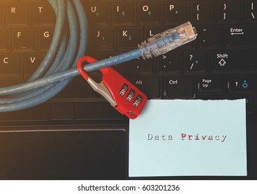 Network Security- Information, connection, communication, and technology security concept. Network cable and red padlock with notes written DATA PRIVACY.