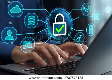 Network security and secure encrypted communication. Data protection. VPN and access control. Businessperson using laptop computer.