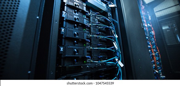Network server room with servers/high performance computers running processes