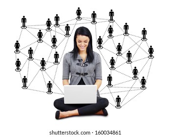 Network or social media concept: young brunette woman or student with laptop surrounded by men and women silhouettes