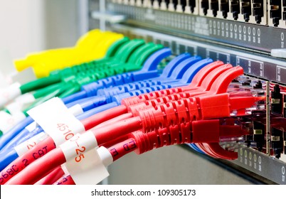 Network switch and UTP ethernet cables - Shutterstock ID 109305173