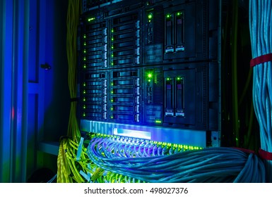 Network switch and UTP ethernet cables close-up in  server room