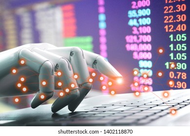 Network technology chatbot robot hand pressing computer keyboard enter of Investment in the puppet market