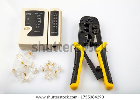  Network Tool Kit Professional, Cat6 Cat5e EZ Rj45 Crimp Tool, 8P8C RJ45 Connectors, Cable Tester, Stripping Pliers Tool Set. Data crimp tool kit isolated on white background.