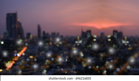 Networking connect technology abstract concept. Polygonal with connecting dots with blur city business background.


