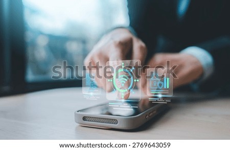 Networking technology mobile security concept hand touching smartphone screen digital hologram wireless wireless connection server padlock shield icons data privacy cyber defense IT infrastructure