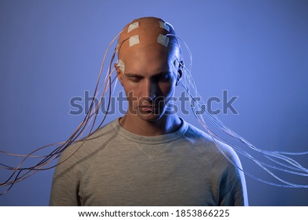 Neurointerface, brain - computer communication. transhumanism concept of a futuristic person connected to virtual reality, digitization of consciousness.