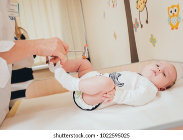 Neurologist Diagnosing Little Boy. Pediatric Examination