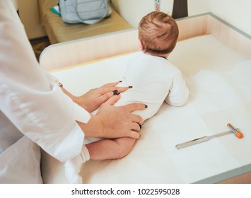 Neurologist Diagnosing Little Boy. Pediatric Examination