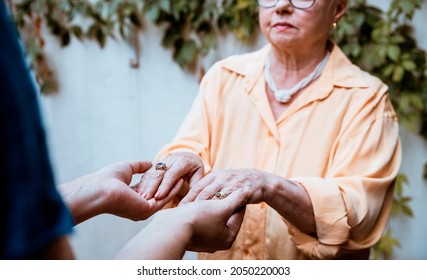 Neurologist Testing Hand Reflex On A Senior Female Patient . Diagnostic, Healthcare. Closeup Exam Neurological Reflexses On Old Woman. 