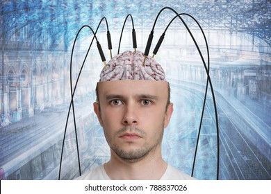 Neuroscience And Brain Research Concept. Reconstruction Of Memory. Young Man Has Cables And Electrodes In His Brain.