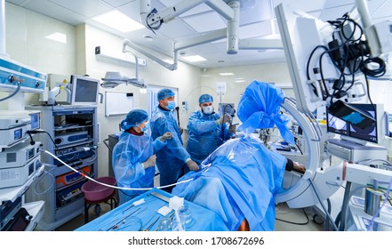 Neurosurgeon Is Operating With Medical Robotic Surgery Machine. Manual Control By Minimally Invasive Surgical System. Modern Automated Medical Device. 