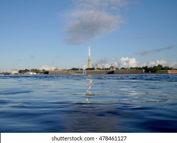 Neva river waves and Peter and Paul fortress at sunny day in St. Petersburg, Russia