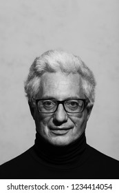 Never get old, handsome, sexy at every age concept. Portrait of fashionable mature man wearing trendy eyewear 