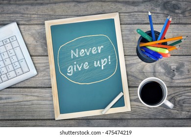Never give up text school board   coffee desk