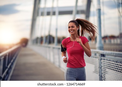 Never Give Up.Female Running In The City.