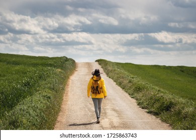 Never Knows What Is Behind The Horizon? Woman Hiking On Road. Getting Out Of Your Comfort Zone Concept