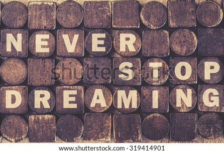 Never Stop Dreaming message. Cross processed image for vintage look