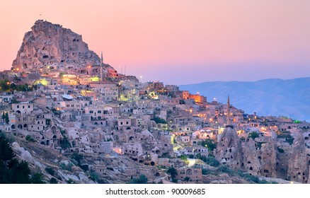 Nevsehir Cave City In Cappadocia, Turkey On Sunset