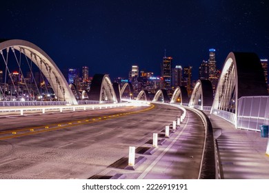 New 6th Street bridge in Los Angeles at night with the Los Angles skyline background, California.