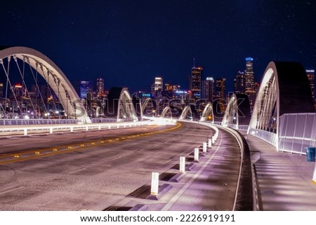 New 6th Street bridge in Los Angeles at night with the Los Angles skyline background, California.