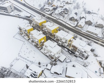 New apartment buildings in winter. Covered in snow. Drone aerial view - Powered by Shutterstock