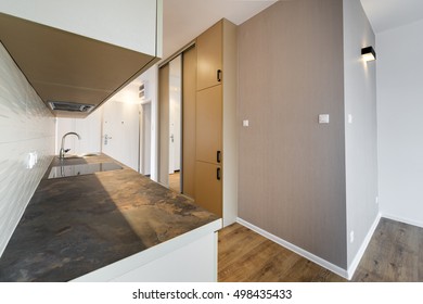 New apartment, empty with domestic kitchen interior design - Shutterstock ID 498435433