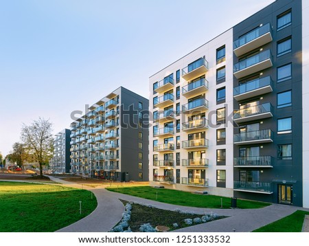 New apartment house residential building outdoor concept. Street and backgrounds.