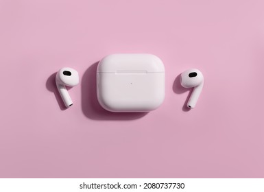 New apple AirPods 3 on pink color background