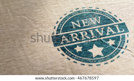 New arrival stamp over a cardboard background, horizontal image.