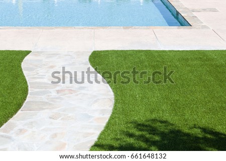 New Artificial Grass Installed Near Walkway and Pool.