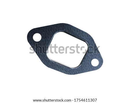 New automotive gasket for the exhaust system isolated on white background. Spare parts.