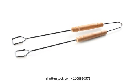 New barbecue tongs with wooden handle on white background