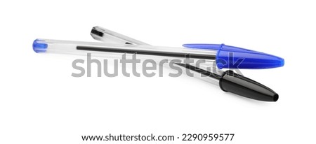 New black and blue pens isolated on white