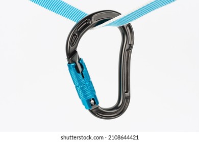 New black HMS carabiner  with automatic twist lock , carabiner climbing  equipmenton  sewn loop sling on white background 