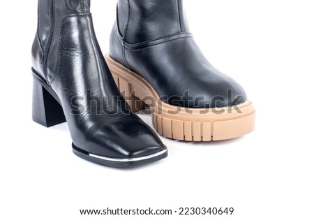 New Black Leather Dressy Boot with Square Metal Toe Verses Casual Chunky Heel Boot With Round Toe and Made of Recycled Materials 