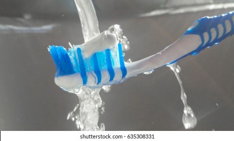 New Blue Toothbrush And Fluoride Toothpaste