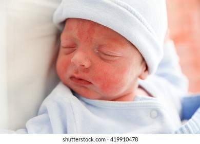 New Born Baby Boy Sleeping In The Cod Just After Being Born