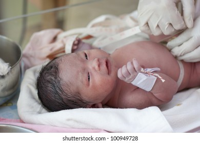 New born baby in doctor's hands