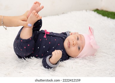 New Born Baby Girl On Texture Blanket, Lying On Blanket, Opened Eyes.