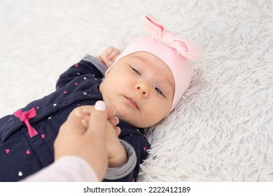 New Born Baby Girl On Texture Blanket, Lying On Blanket, Opened Eyes.