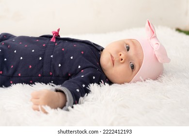 New Born Baby Girl On Texture Blanket, Lying On Blanket, Opened Eyes.