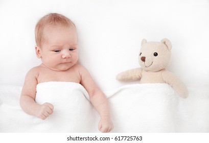 New Born Baby Girl Sleeping With Her Teddy Bear