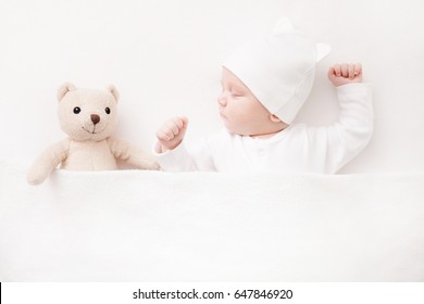 New Born Baby Girl Sleeping With Her Teddy Bear