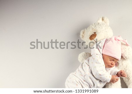 Similar – Closeup  of baby girl with pacifier sleeping